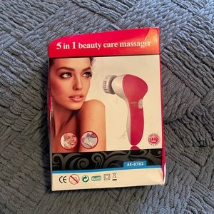 This is a 5 in 1 beauty care massager to clean your face to perfection